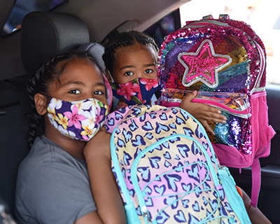 2-girls-and-2-backpacks.jpg