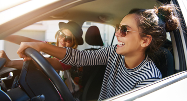 image of a student driving a vehicle